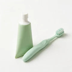 Toothbrush and paste